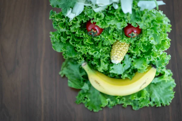 Face made of parts of healthy food — Stock Photo, Image