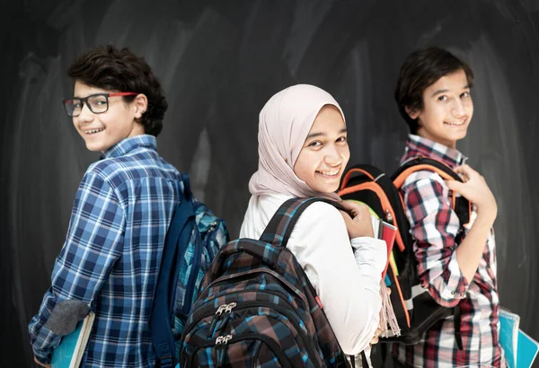 Group of multy ethnic kids in classroom — Stock Photo, Image