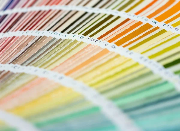 Colour swatches book with rainbow sample colors catalogue — Stock Photo, Image