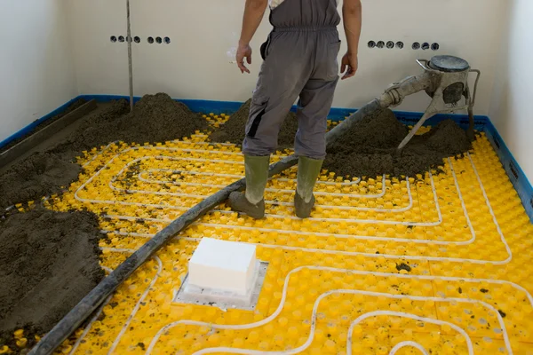 Plâtrier au sol intérieur en béton ciment — Photo