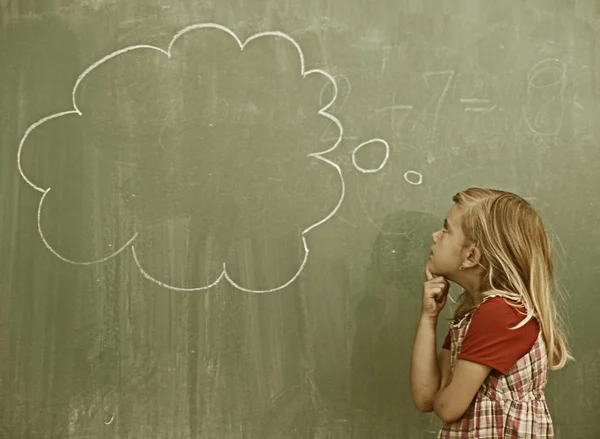 Little girl at school having education activities — Stock Photo, Image