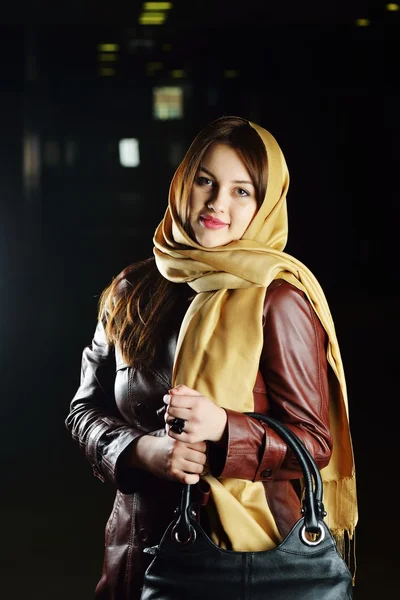 Young beautiful woman posing with fashionable leather clothes — Stock Photo, Image