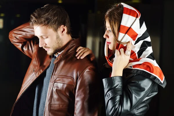 Fashionable young couple with leather clothes on — Stock Photo, Image