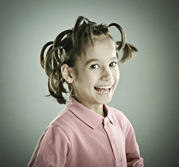 Retrato engraçado de criança com penteado — Fotografia de Stock