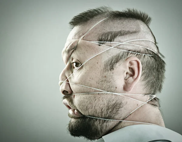 Conceptual portrait of mad man with unusual hairdress — Stock Photo, Image