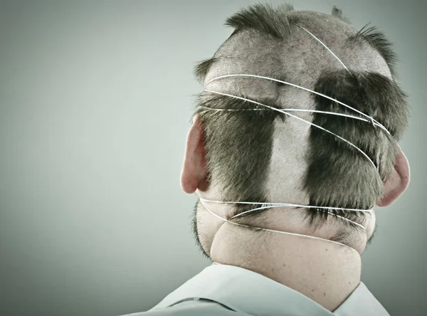 Conceptual portrait of mad man with unusual hairdress — Stock Photo, Image