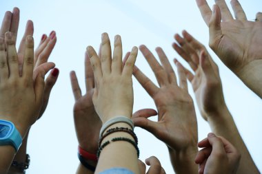 Group raising hands clipart