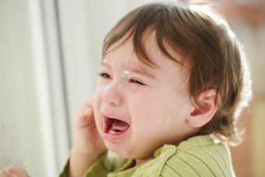 Adorable baby boy crying clipart