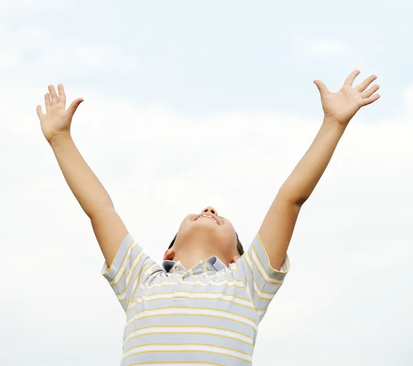 Happy kid on summer grass meadow in nature — Stock Photo, Image