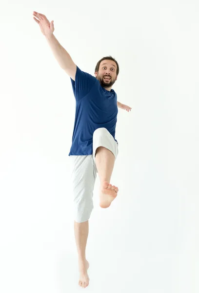 Чоловік стрибає і робить жести і вирази — стокове фото