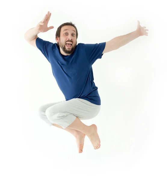 Mann springt und macht Gesten und Ausdrücke — Stockfoto