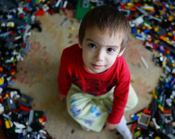 Child playing with construction blocks — Stock Photo, Image