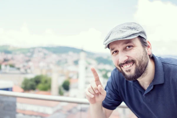 Image of an excited man on the top of the city — Stock Photo, Image