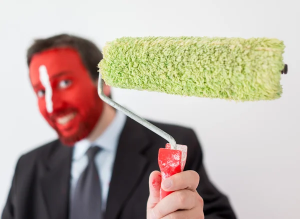 Man ready to brush and paint walls — Stock Photo, Image