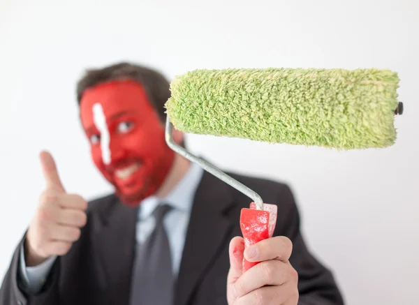 Man ready to brush and paint walls — Stock Photo, Image