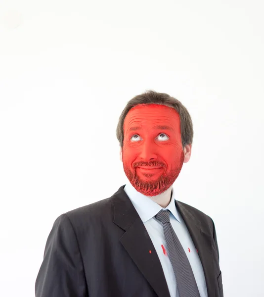 Νεαρός προσωπογραφία με κόκκινο βαμμένο πρόσωπο Εικόνα Αρχείου