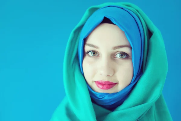 Beautiful young woman with a scarf — Stock Photo, Image