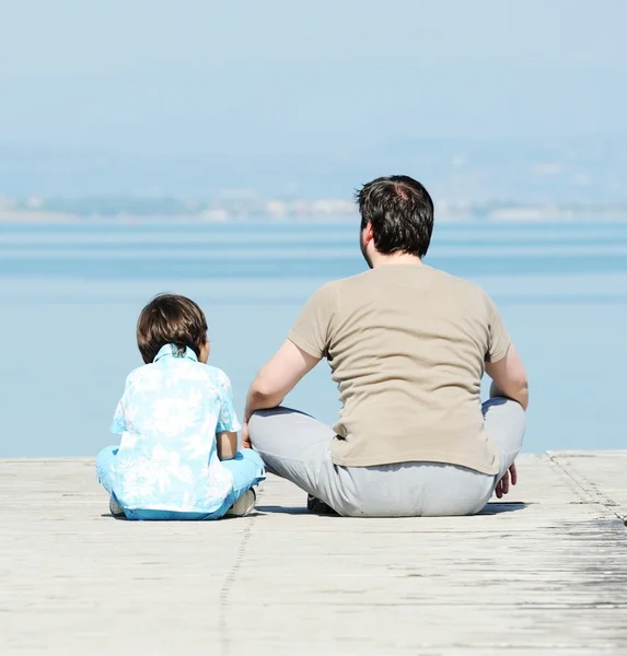 Father and son on the dock — Stock Photo, Image