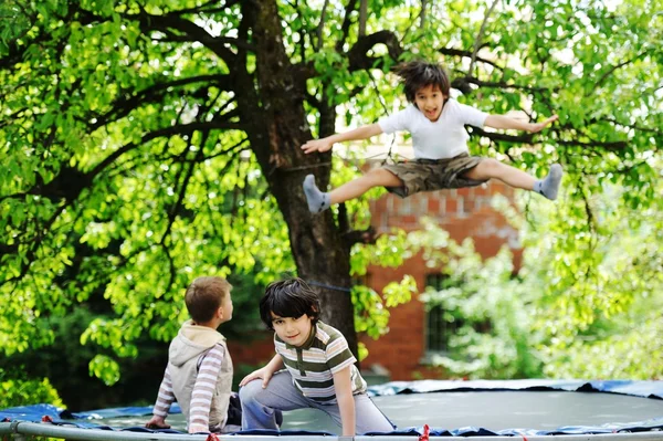 Happy children enjoying childhood — Stock Photo, Image