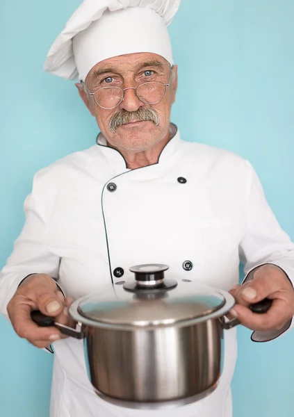 Elderly chef in uniform — Stock Photo, Image