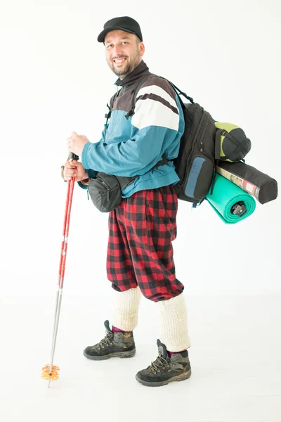 Jovem caminhante com mochila e botas — Fotografia de Stock