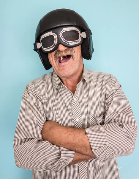 Senior funny man as a pilot — Stock Photo, Image