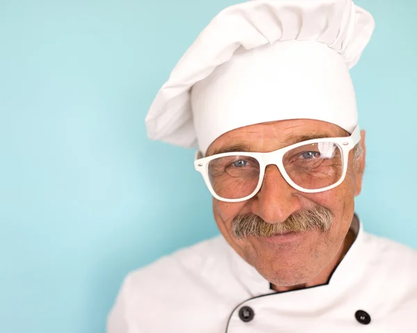 Elderly chef in uniform