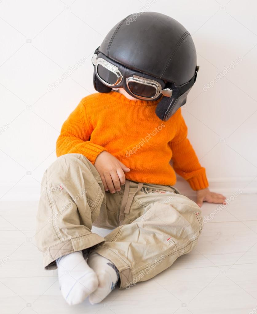 Little cute kid with pilot hat