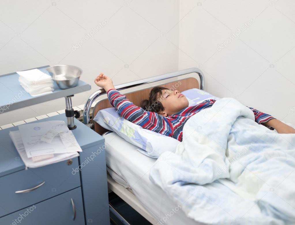 Kid patient in hospital bed