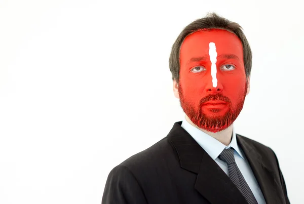 Jeune homme portrait avec visage peint en rouge — Photo