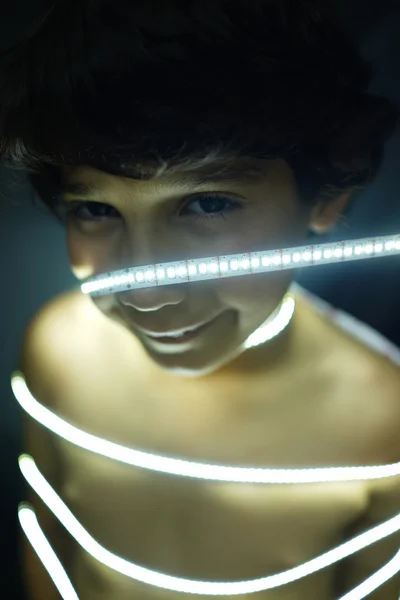 Portrait of kid with led strip light — Stock Photo, Image