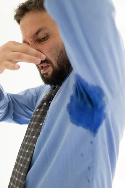 Business man sweating under armpit in blue shirt — Stock Photo, Image