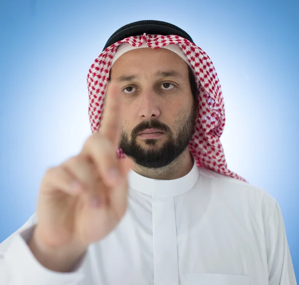 Arabian man pekar med finger — Stockfoto