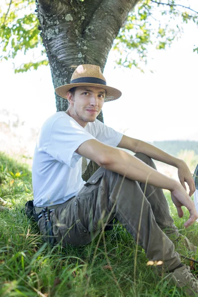 Young man enjoying in natural park — Stock Photo, Image