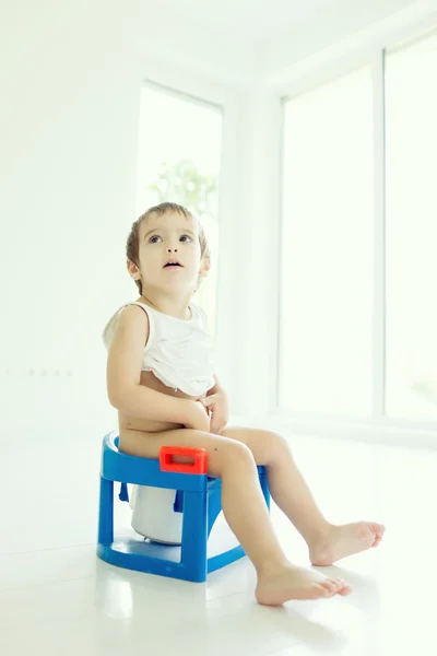 Adorable little boy on toilet — Stock Photo, Image