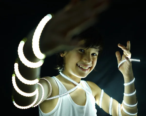 Portret van kind met led strip licht — Stockfoto