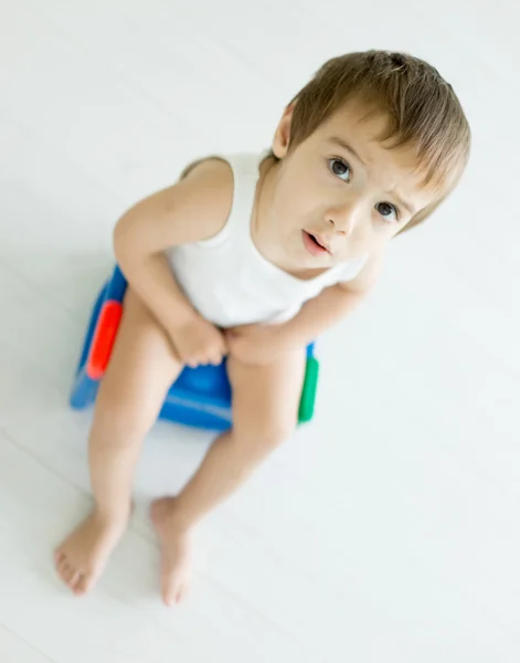 Adorable little boy on toilet — Stock Photo, Image