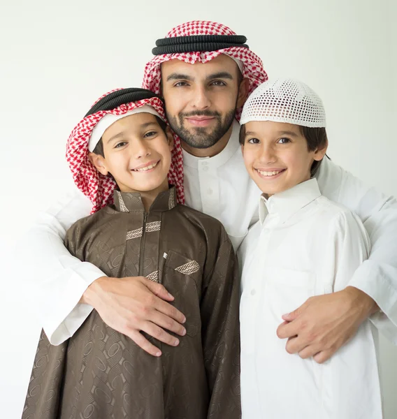 Arabic young father posing with kids — Stock Photo, Image