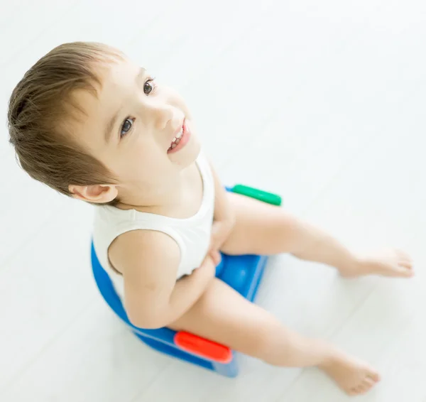 Adorable little boy on toilet — Stock Photo, Image