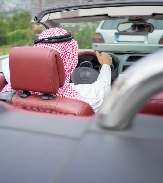 Arabic young businessman driving car — Stock Photo, Image