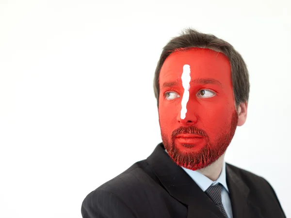 Retrato de jovem com rosto pintado de vermelho — Fotografia de Stock