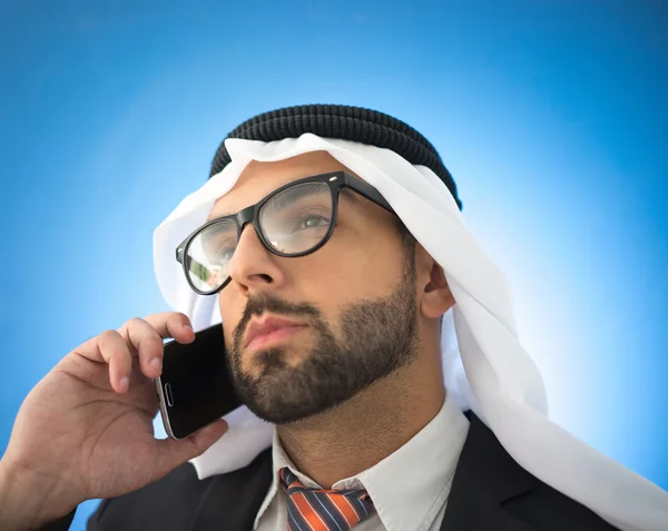 Arab man with gadget Stock Picture