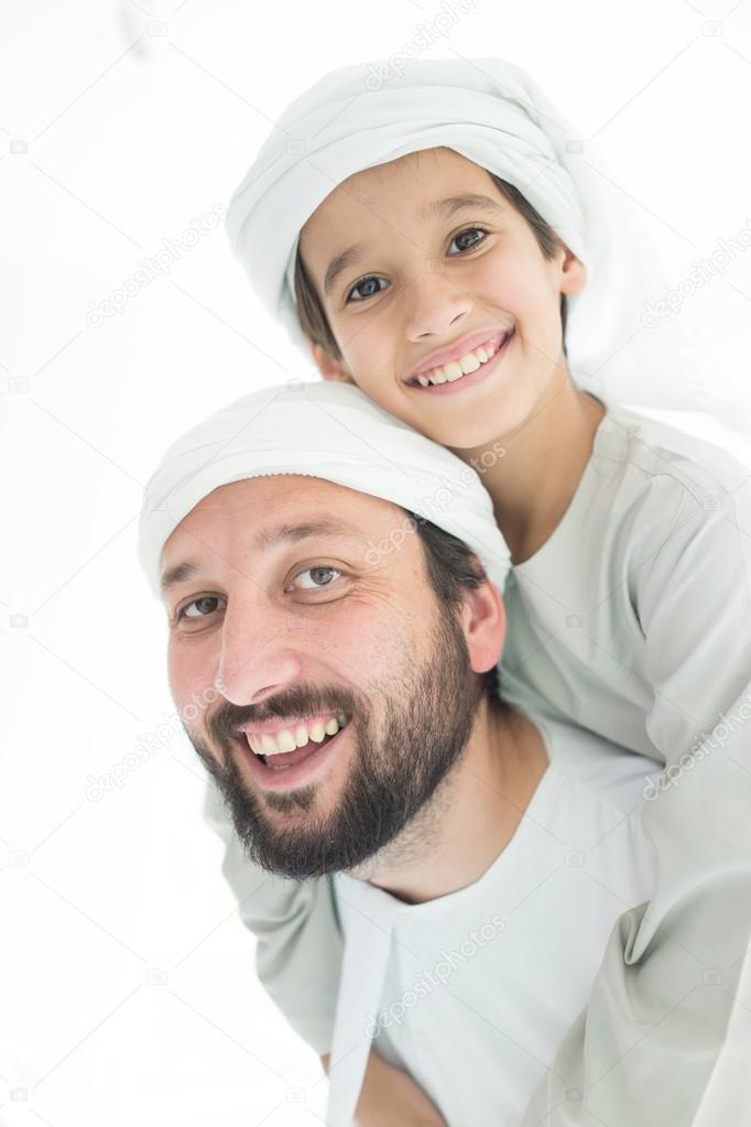 Happy Arabic father and son