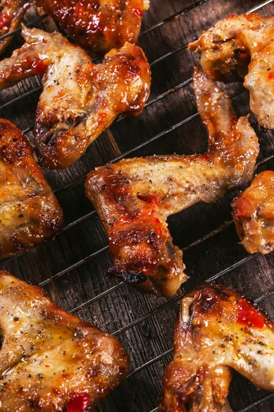 Chicken wings on grill