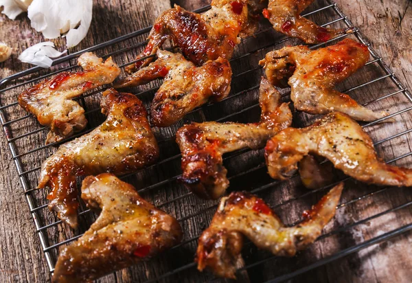 Chicken wings on grill