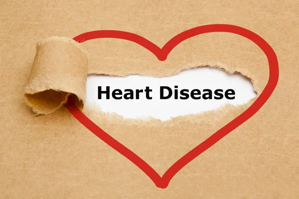 Doença cardíaca papel rasgado — Fotografia de Stock