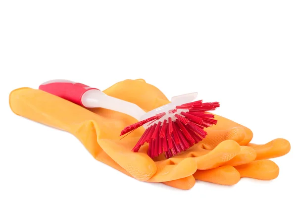 Red dish washing brush with rubber gloves — Stock Photo, Image