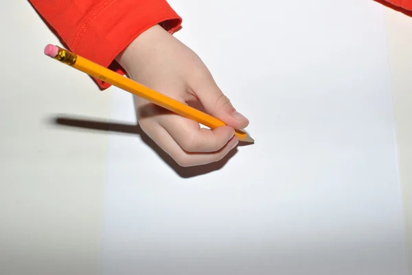 Escritura infantil con lápiz Imagen De Stock