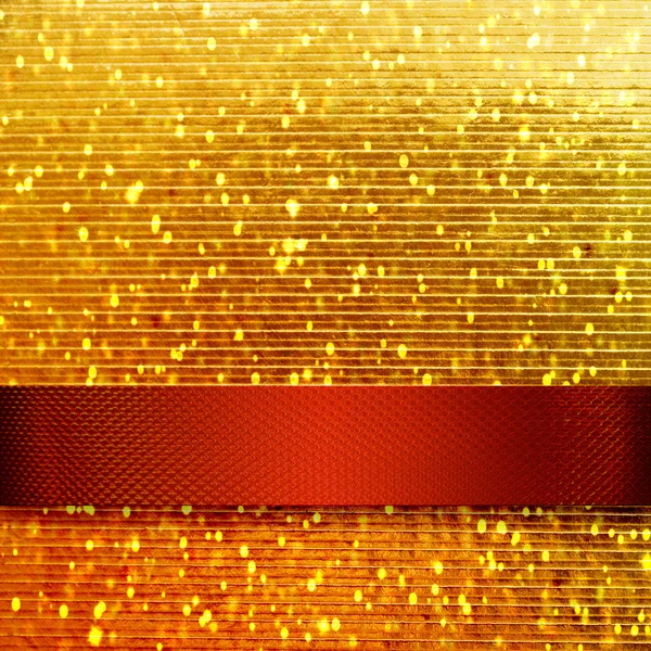 Fondo de oro con rica cinta roja — Foto de Stock