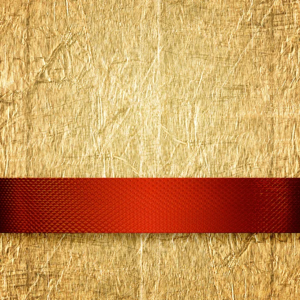 Золотий фон з багатою червоною стрічкою — стокове фото